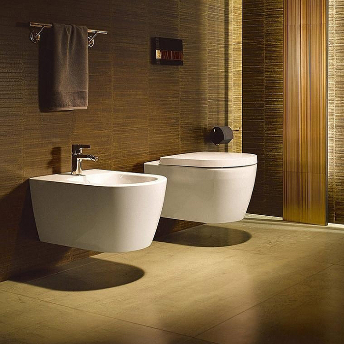 Фото Унитаз подвесной Duravit Me by Starck 452909AAA1, безободковый, с сиденьем с микролифтом, белый глянцевый